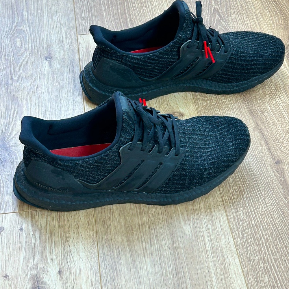 Men’s ultra boost sneakers in black size 10.5